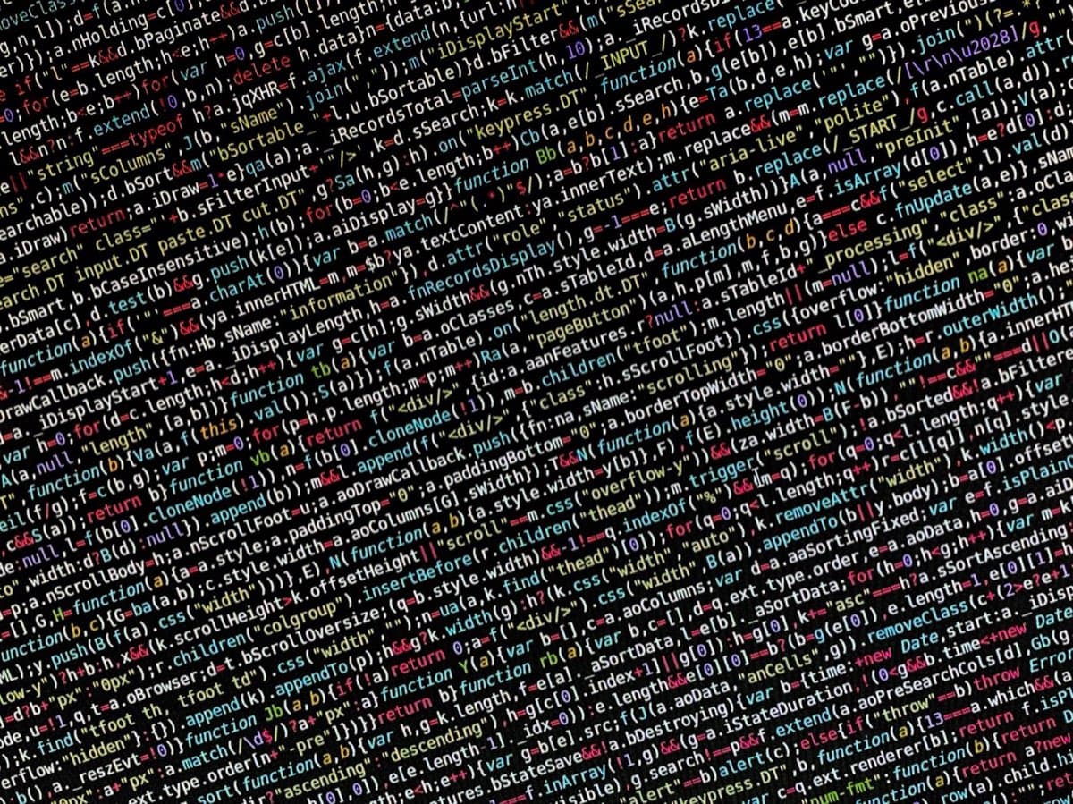 Lines of API integration code displayed on a laptop screen